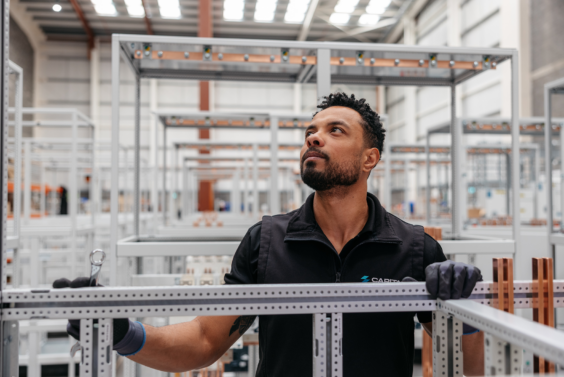 Capital Dublin switchgear facility, worker looking up